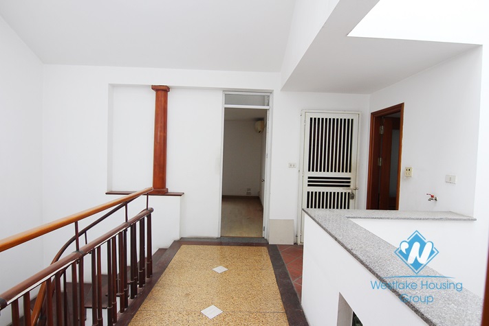 Unfurnished 4 bedrooms house with garage for rent in Xuan Dieu st, Tay Ho area.